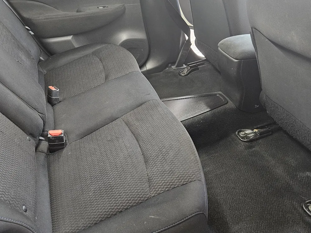 Dirty, stained rear seats before an interior detail